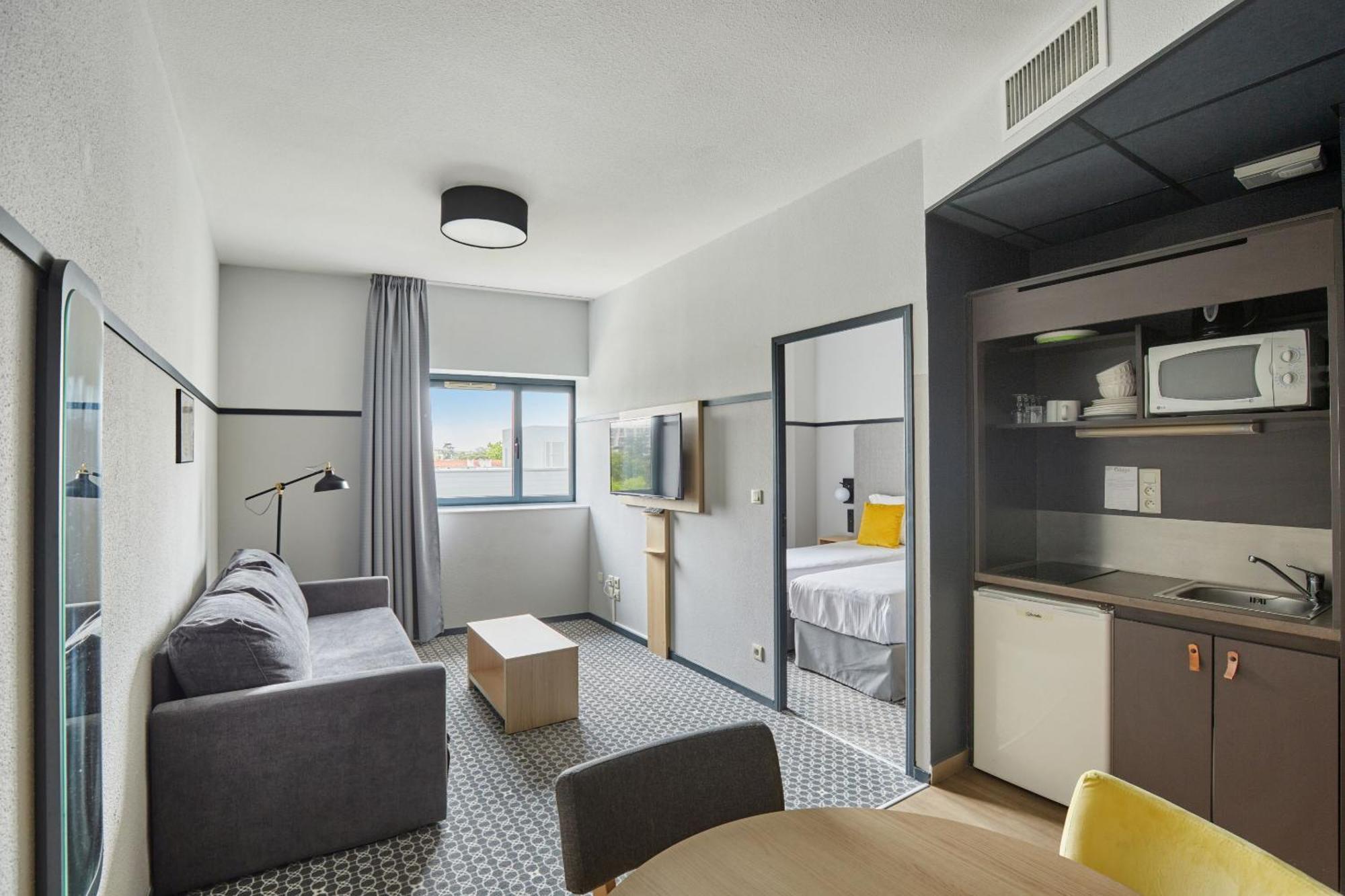 Appart'Hotel Odalys City - Bioparc Lyon Est Экстерьер фото