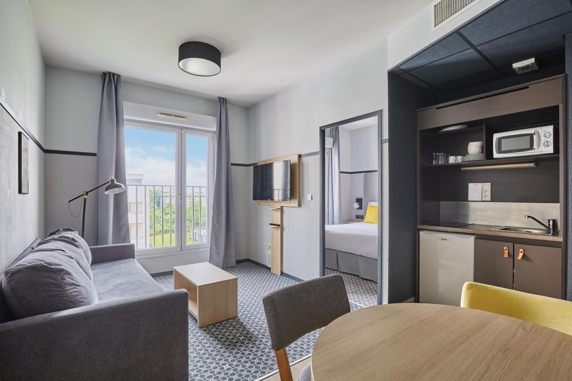 Appart'Hotel Odalys City - Bioparc Lyon Est Экстерьер фото